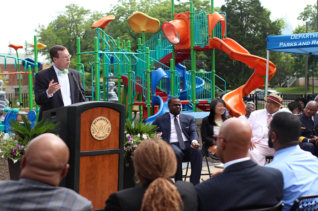 Michael Halicki addresses stakeholders and community members at Vine City Park. Right: Mayor Kasim Reed, Commissioner of Dept. of Parks & Recreation Amy Phuong, and Councilmember Ivory Young.